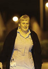 Nurse Heather McAugheran on home visit at night