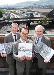 ©Press Eye Ltd Northern Ireland -  June 28 2014
Mandatory Credit -  Darren Kidd /Presseye.com

 An Integrated Design Team has been appointed for the development of a major new Transport Hub for Belfast. The design team and architects who comprise of Arup, Lead Architect Hiro Aso and John McAslan and Partners have an extensive portfolio in the development and delivery of modern and highly efficient transports infrastructure facilities including Kings Cross Station in London.   The Hub is set to be located on the 20 acre site of the existing Europa Buscentre and Great Victoria Street Train Station.   Announcing the appointment are  Transport Minister Danny Kennedy MLA (right)and Translink Infrastructure Executive Clive Bradberry (left) with the design team lead architect Hiro Aso.


 
EMBARGOED: NOT FOR PRINT OR BROADCAST BEFORE 3.15PM ON TUESDAY 1ST JULY 2014 
 
DRD PRESS RELEASE
 
1 July 2014
 
Kennedy appoints design team for development of Belfast Transport Hub 
 
The goal of delivering a 21st Century Transport Hub for Belfast as an urban gateway to the city and beyond has moved one step closer with the appointment of an Integrated Design Team for the project.
 
The new design team and architects who comprise of Arup, Lead Architect Hiro Aso and John McAslan and Partners have an extensive portfolio in the development and delivery of modern and highly efficient transports infrastructure facilities including Kings Cross Station in London.  
 
The Hub is set to be located on the 20 acre site of the existing Europa Buscentre and Great Victoria Street Train Station.   Already around 7 million passengers use these facilities each year and as more people choose to use the bus and train this is estimated to increase to around 13 million passengers by 2030.
 
Making the announcement, Transport Minister Danny Kennedy said: “This is one of the most exciting and ambitious public transport developments to be seen in Northern Ireland.  I welcome the design team from Arup, Lead Architect Hiro Aso and the team from John McAslan and Partners who bring a wealth of experience in the design of modern transport infrastructure.
 
“With a steady year-on-year increase in the number of people choosing to use bus and train it is vital that we grow our already excellent public transport infrastructure to meet the increase in demands that we know are ahead of us.
 
“As well as the improved transport links, this project also offers huge benefits for Belfast and Northern Ireland as a whole.  The enhanced transport hub has the potential to become a ‘green urban gateway’ revitalising Belfast city centre. Indeed it was recently cited in the Urban Strategies Report commissioned and published by Belfast City Council as one of the top projects needed to deliver the overall vision of Belfast as a modern European City helping to attract tourism and investors which will significantly boost the region’s economy.
 
Continuing the Minister said the transport hub has the potential to be a catalyst for regenerating the wider area in terms of a new office district, retail and leisure facilities.
 
He said: “The hub has the very clear potential to strengthen the heart of Belfast. This will bring with it employment for the construction sector, business for local retailers and jobs in the service sectors  - this is also good news for the neighbouring communities, particularly those in the adjoining Sandy Row and the Lower Falls areas.
 
“Today the vision of delivering an excellent transport Hub for Northern Ireland that will rank among the best in Europe has just moved closer.” 
 
Clive Bradberry, Translink Infrastructure Executive said, “Public transport in Northern Ireland continues to grow at a pace – over 80 million passenger journeys last year.  Our current infrastructure is now operating at almost full capacity and as such we need to plan to have the proper infrastructure in place so we can build on Northern Ireland’s passenger transport success story. 
 
We plan to operate all trains including our cross border Enterprise services from the new Transport Hub enabling greater connectivity with local rail, bus and coach options  providing  more attractive, integrated and accessible travel choices. Northern Ireland is now on a world stage having successfully hosted many major events - most recently the Giro d’Italia.  We are very much looking forward to working with our new design team and the Department for Regional Development to take this exciting project forward”.
 
Hiro Aso, Lead Architect at John McAslan + Partners, commented on the team’s appointment, “This project represents one of the largest city centre developments in Belfast for many years and offers the opportunity to create a significant landmark at a key gateway to the city. The team we’ve assembled will bring innovative, fresh thinking to the complexities of Belfast’s transportation challenges.”
 
 
The Department in partnership with Translink and the Strategic Investment Board has been working to develop the feasibility of the new Transport Hub and the appointment of the design team takes the project to the next phase.
 
Ends
 
All media enquiries including interview set-up: Translink press office’s Lynda Shannon 07771 987138 or Ursula Kelleher 07786 884024. 
 
Notes to the Editor
The new design team and architects have an extensive portfolio in the development and delivery of modern and highly efficient transports infrastructure facilities including Kings Cross Station in London.   
 
 
Ursula Kelleher | PR & Public Affairs Officer | Translink 
Central Station | East Bridge Street | Belfast | BT1 3PB
Tel: 028 90 66 66 30 ext 2734 | Mob: 07786 884024 | Twitter: @TranslinkPress 
 
Journeys and more at www.translink.co.uk