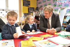 6/2/14: Education Minister John O’Dowd with pupils at Anahorish Primary School, Toomebridge. The Minister enjoyed a tour of Anahorish PS as he visited two schools in the Magherafelt District Council area. Minister O’Dowd subsequently went on to visit Kilronan School, a special school in Magherafelt.. Picture: Michael Cooper