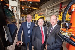 Employment and Learning Minister Dr Stephen Farry today visited Caterpillar (NI) in Larne to tour the facility and observe the training being provided for the company’s Material Handling Project which has been supported by £220,000 of funding from the Department's Assured Skills Programme. Also pictured (ltr) Philip Boyd, BMC Trainer and Robert Kennedy, Caterpillar (NI) Operations Director.