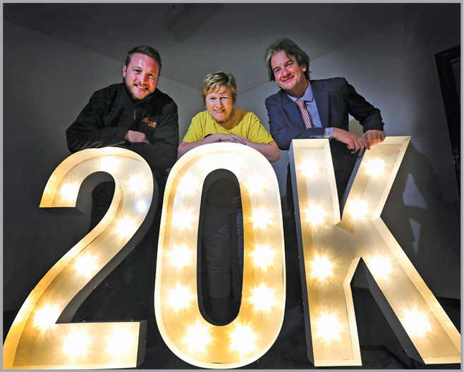 Michael Scott, Managing Director of firmus energy (far right), and colleague Joe Diver (far left), are pictured with Cathy McKillop from SHINE, celebrating the news that firmus energy team members have raised £20,000 for the charity.