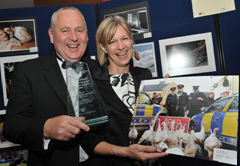 John McVitty celebrates with Patricia Quinn from BT at the NIPPA BT Press Photographer of the Year 