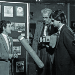 Olympic medal winning boxer Hugh Russell interviewed by Eamonn Holmes during the launch of Belfast Exposed’s first exhibition in 1993.